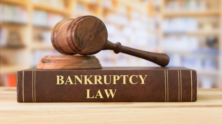 Gavel on top of a bankruptcy book