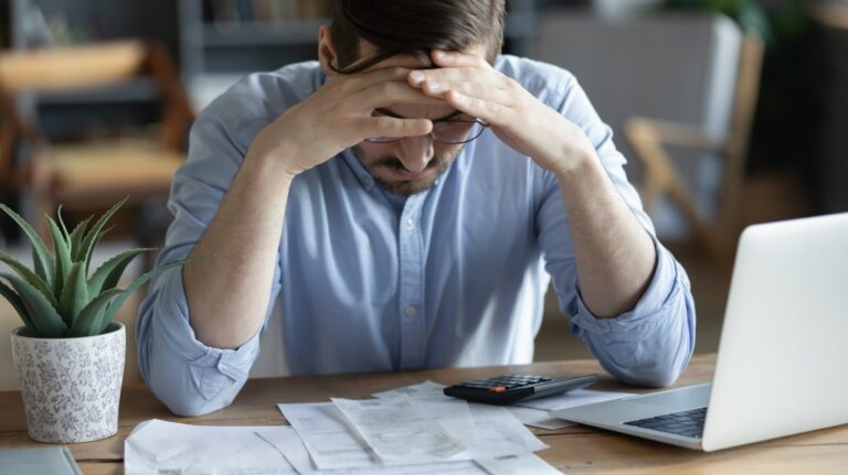 man in distress over finances