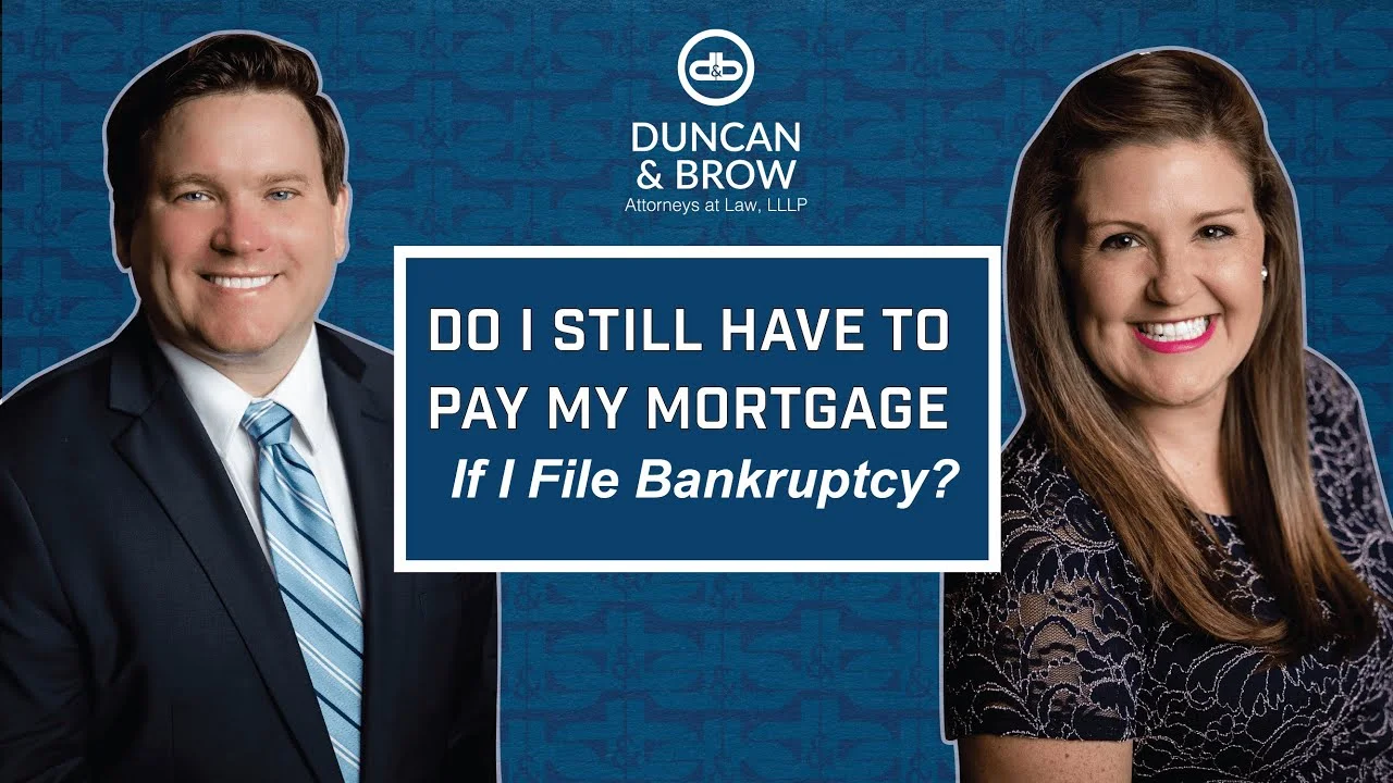 A man and woman posing for a picture