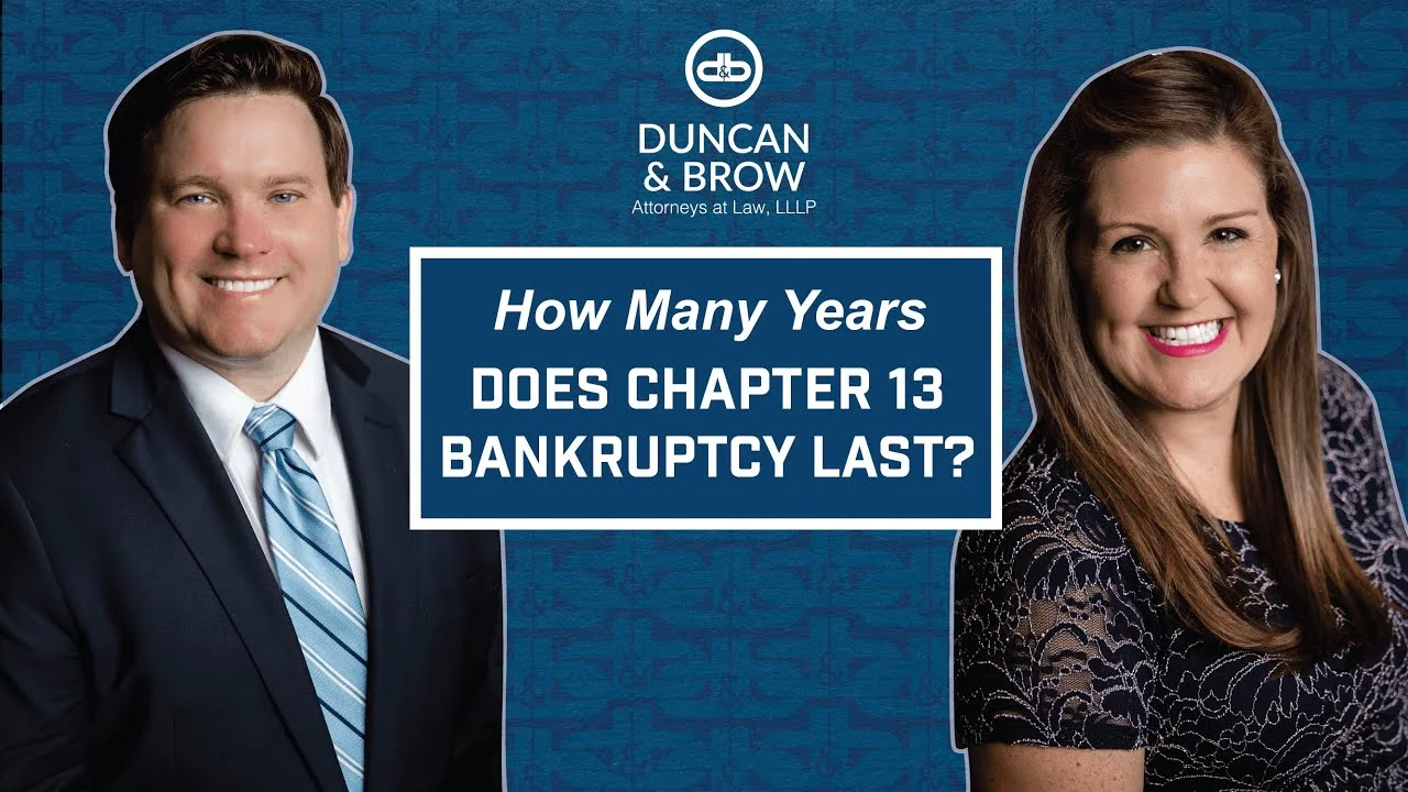 A man and woman posing for a picture