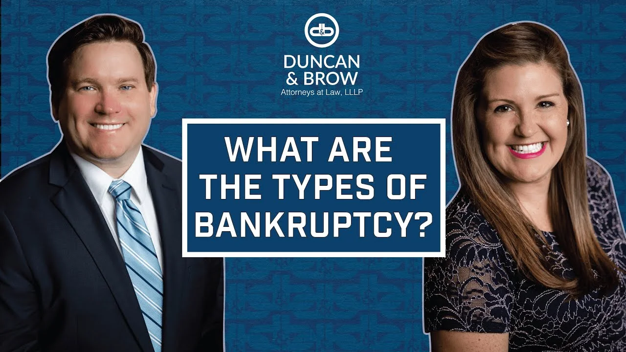 A man and woman posing for a picture