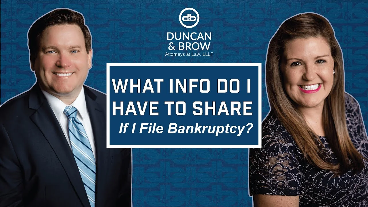 A man and woman posing for a picture